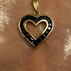 Sapphire and 14k gold heart pendant.